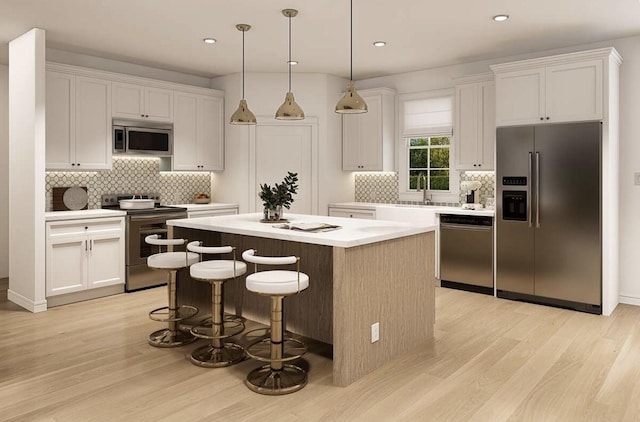OttoTBD Thompson Road, Weatherford, TX 76087 - kitchen featuring a kitchen island, stainless steel appliances, white cabinets, and light wood-style floors