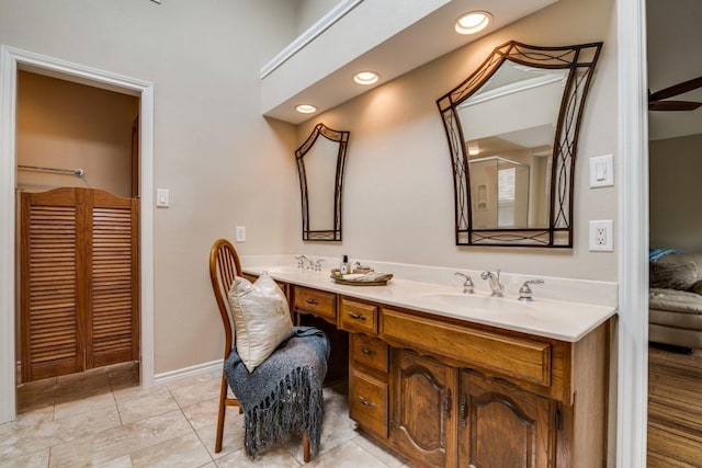 bathroom featuring recessed lighting, vanity, and tile patterned floors