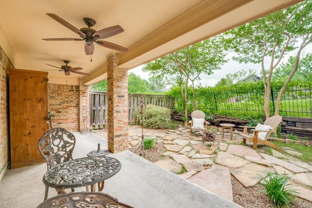 view of patio featuring ceiling fan and a fenced backyard