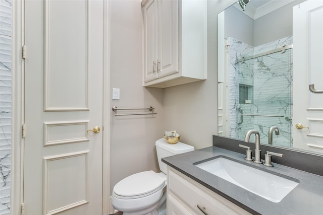 full bath with crown molding, a stall shower, toilet, and vanity