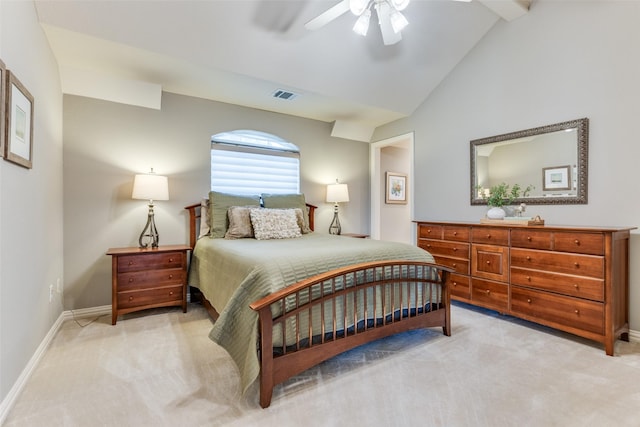 carpeted bedroom with baseboards, a ceiling fan, vaulted ceiling, and visible vents