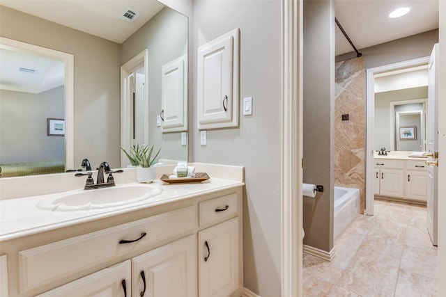 full bath with vanity, shower / bathing tub combination, and visible vents