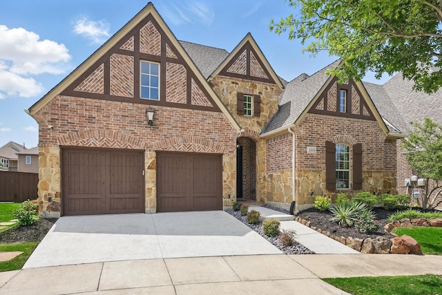 view of front facade featuring a garage, brick siding, concrete driveway, a shingled roof, and stone siding