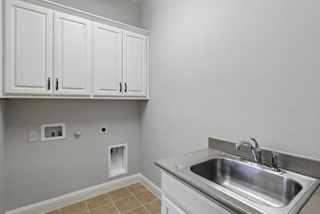 laundry area featuring cabinet space, washer hookup, a sink, baseboards, and hookup for an electric dryer