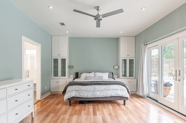 bedroom with recessed lighting, access to outside, light wood finished floors, and visible vents
