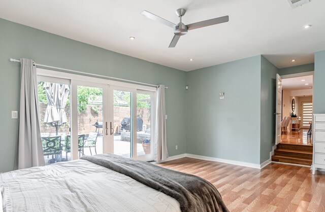 bedroom with access to exterior, baseboards, recessed lighting, french doors, and light wood finished floors