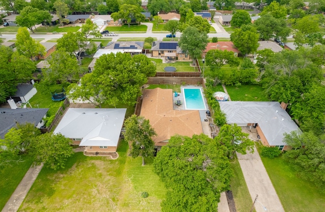 birds eye view of property with a residential view