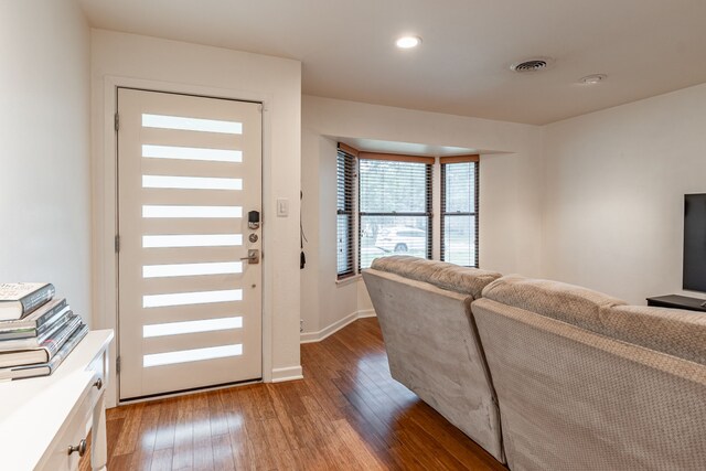 foyer featuring recessed lighting, baseboards, visible vents, and light wood finished floors