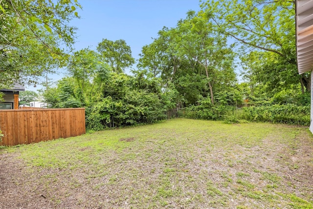 view of yard featuring fence