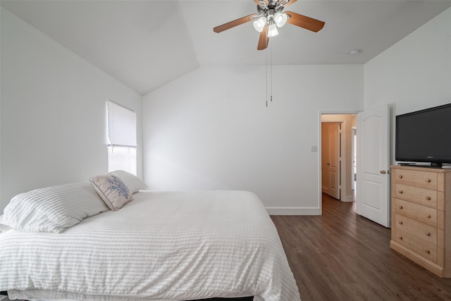 bedroom featuring baseboards, dark wood finished floors, ceiling fan, and lofted ceiling