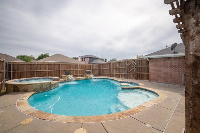 view of swimming pool with an in ground hot tub, a fenced in pool, and a fenced backyard