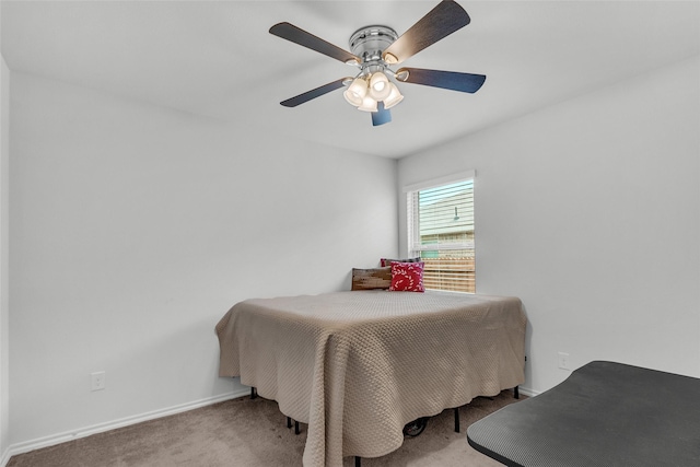 bedroom featuring carpet floors, baseboards, and ceiling fan