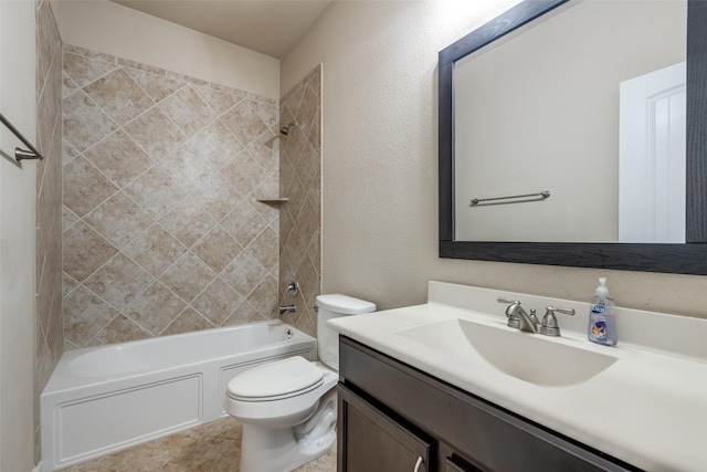 full bathroom featuring toilet, bathing tub / shower combination, and vanity