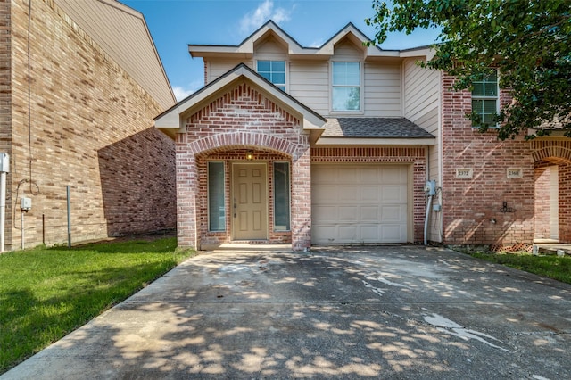 2372 Homewood Ln, Grand Prairie, TX 75050 - traditional-style house with brick siding, an attached garage, concrete driveway, and a shingled roof