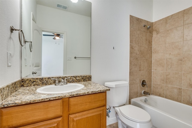 2372 Homewood Ln, Grand Prairie, TX 75050 - full bathroom featuring toilet, vanity, bathtub / shower combination, and ceiling fan