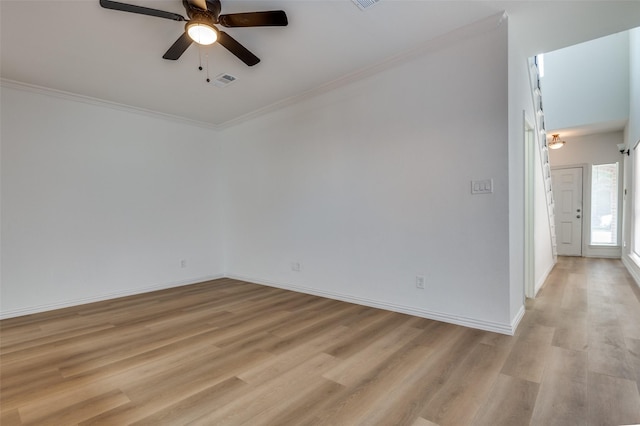 2372 Homewood Ln, Grand Prairie, TX 75050 - unfurnished room with a ceiling fan, light wood finished floors, ornamental molding, and baseboards