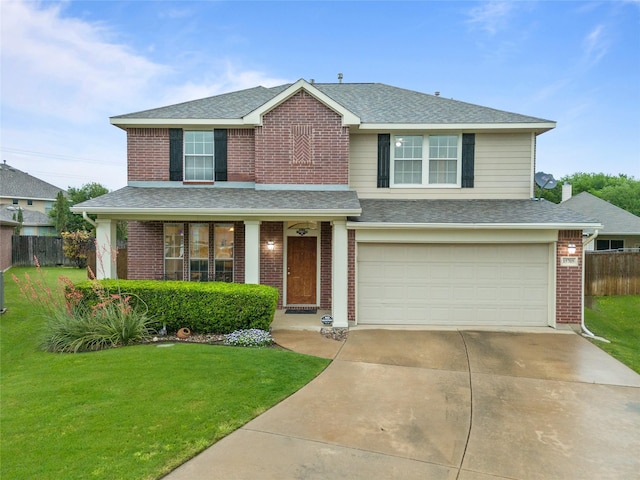 traditional home featuring an attached garage, fence, roof with shingles, and a front lawn