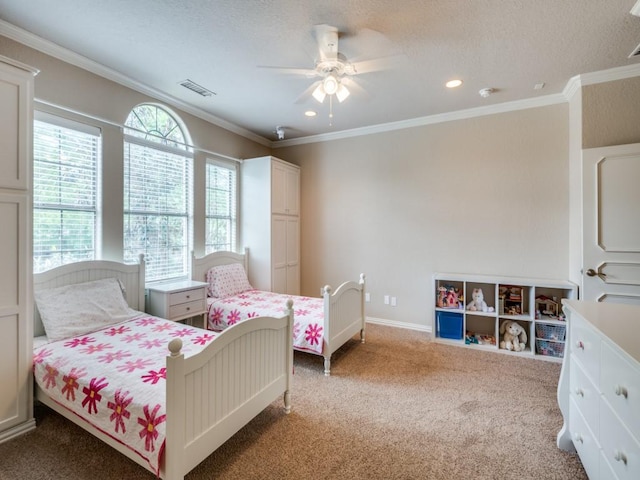 bedroom with carpet, crown molding, recessed lighting, ceiling fan, and a textured ceiling