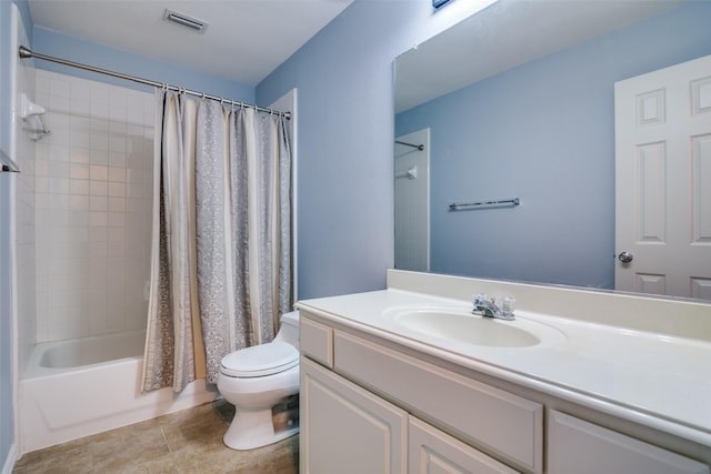 bathroom with visible vents, tile patterned flooring, vanity, toilet, and shower / tub combo with curtain