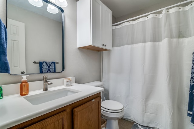 bathroom with vanity, tile patterned flooring, toilet, and a shower with shower curtain