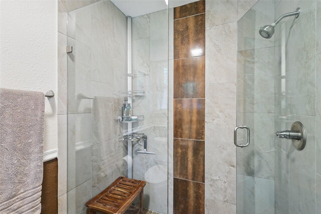 bathroom featuring a stall shower