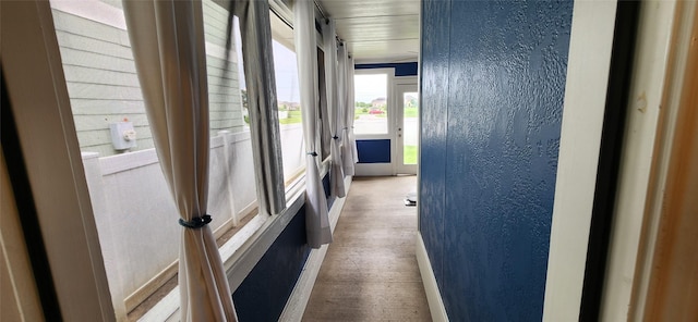 1213 Charleston Ln, Savannah, TX 76227 - hall featuring baseboards, wood finished floors, and a textured wall
