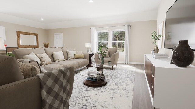 living room featuring baseboards, recessed lighting, and wood finished floors
