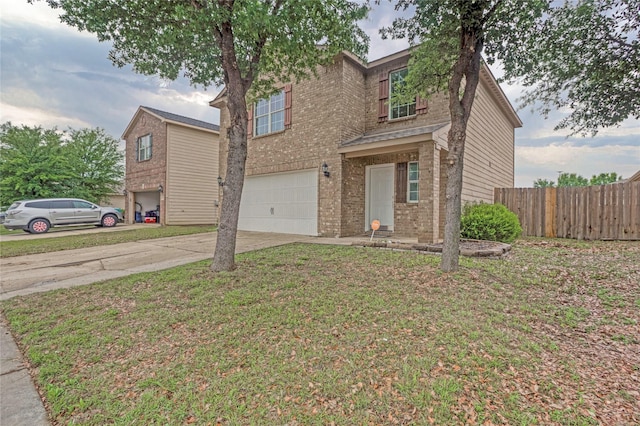 604 Hidden Dale Dr, Fort Worth, TX 76140 - traditional home featuring a garage, concrete driveway, and brick siding