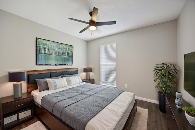1706 Delaford Cir, Carrollton, TX 75007 - bedroom with baseboards, ceiling fan, and dark wood-style floors