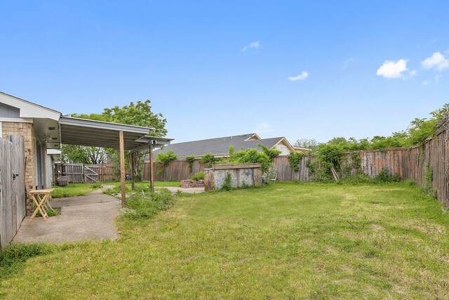 1706 Delaford Cir, Carrollton, TX 75007 - view of yard with a patio and a fenced backyard