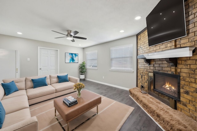 1706 Delaford Cir, Carrollton, TX 75007 - living room featuring a ceiling fan, a fireplace, baseboards, recessed lighting, and dark wood-type flooring