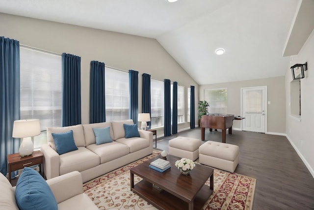 1706 Delaford Cir, Carrollton, TX 75007 - living room featuring baseboards, vaulted ceiling, and wood finished floors