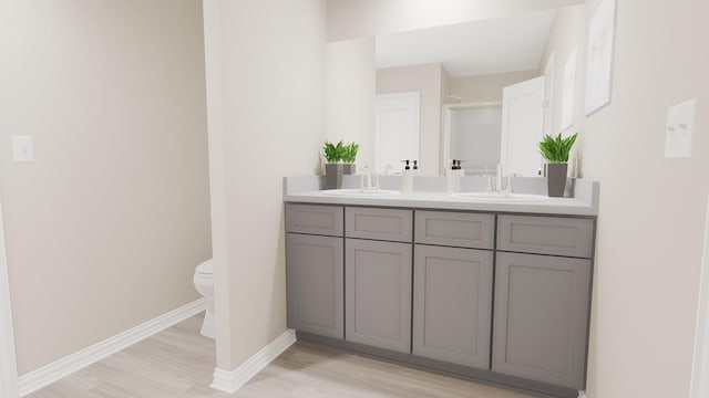 414 Rose Ave, Cleburne, TX 76033 - full bath featuring a sink, double vanity, toilet, and wood finished floors
