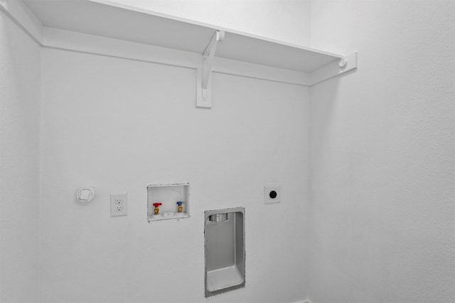 laundry area with hookup for an electric dryer, laundry area, and hookup for a washing machine