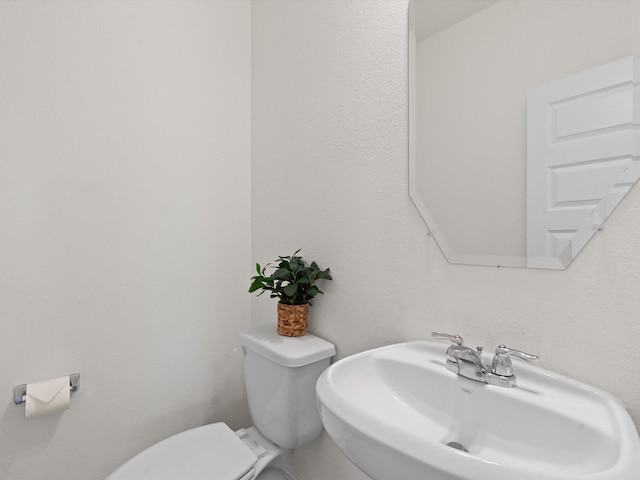 3601 Keechi Creek Dr, Celina, TX 75078 - half bathroom featuring toilet and a sink