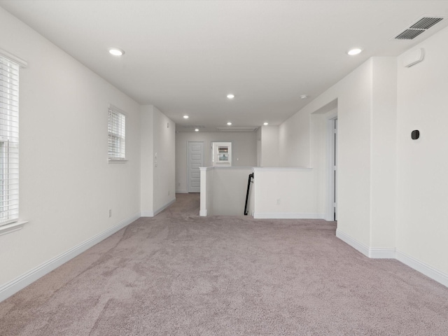 3601 Keechi Creek Dr, Celina, TX 75078 - unfurnished room featuring light carpet, baseboards, visible vents, and recessed lighting