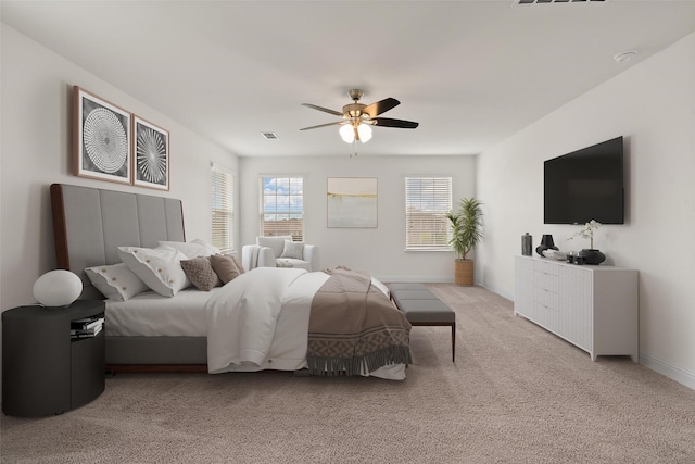 3601 Keechi Creek Dr, Celina, TX 75078 - carpeted bedroom featuring multiple windows, visible vents, baseboards, and ceiling fan
