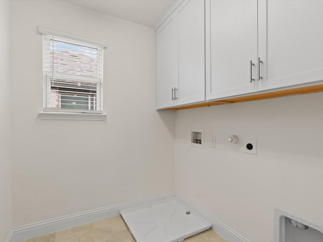 3601 Keechi Creek Dr, Celina, TX 75078 - clothes washing area with electric dryer hookup, cabinet space, washer hookup, hookup for a gas dryer, and baseboards