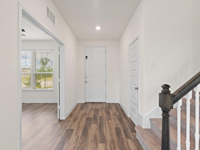 3601 Keechi Creek Dr, Celina, TX 75078 - foyer entrance with stairs, baseboards, dark wood-type flooring, and visible vents