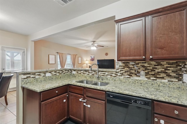 kitchen with black dishwasher, a sink, decorative backsplash, a peninsula, and ceiling fan