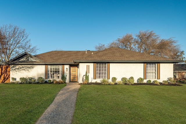 3005 Macao Ct, Plano, TX 75075 - ranch-style home featuring brick siding, a shingled roof, and a front yard