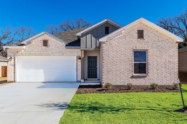 119 Kylie Dr, Cleburne, TX 76031 - ranch-style home with concrete driveway, board and batten siding, an attached garage, and a front lawn