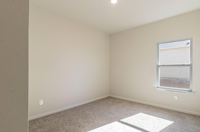 119 Kylie Dr, Cleburne, TX 76031 - carpeted spare room with baseboards and recessed lighting