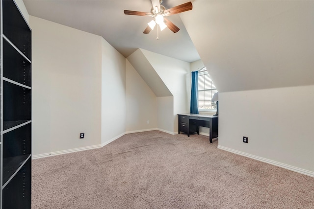 bonus room featuring carpet floors, baseboards, ceiling fan, and vaulted ceiling