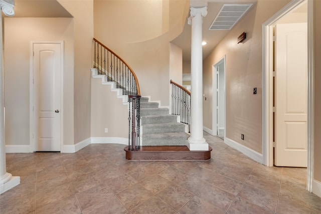 132 Silver Rose Blvd, Burleson, TX 76028 - stairway featuring ornate columns and baseboards