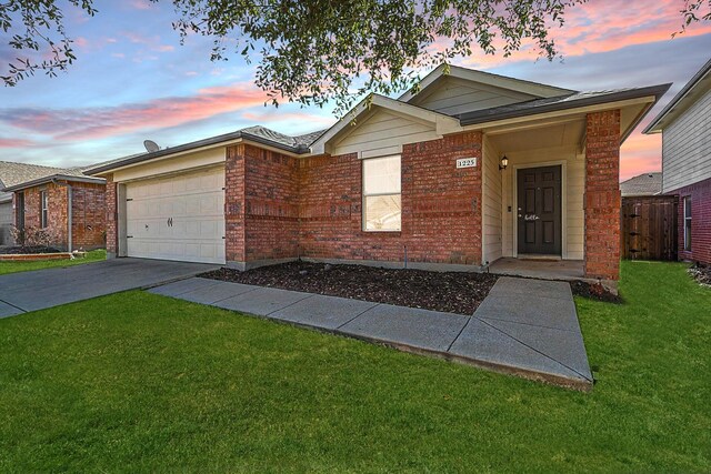 1225 Bellevue Dr, Princeton, TX 75407 - ranch-style house with a front yard, brick siding, fence, concrete driveway, and an attached garage