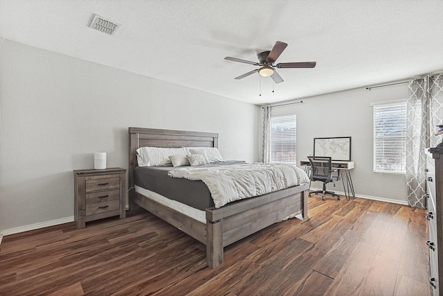 1225 Bellevue Dr, Princeton, TX 75407 - bedroom with baseboards, a ceiling fan, wood finished floors, and visible vents