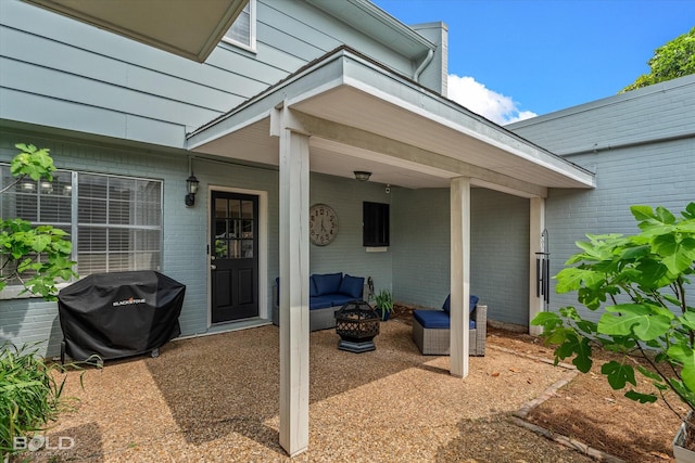 view of patio / terrace with grilling area and outdoor lounge area