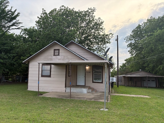 3709 N State Highway 91, Denison, TX 75020 - bungalow-style home featuring covered porch and a front lawn