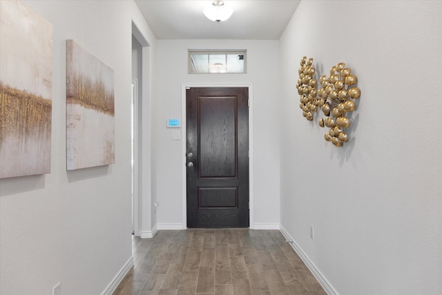 1008 Sublime Dr, Heath, TX 75126 - doorway with baseboards and wood finished floors